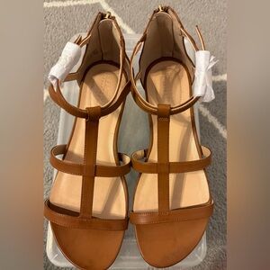 Reaction by Kenneth Cole sandals. Size 7.5 M, tan color, very small wedge